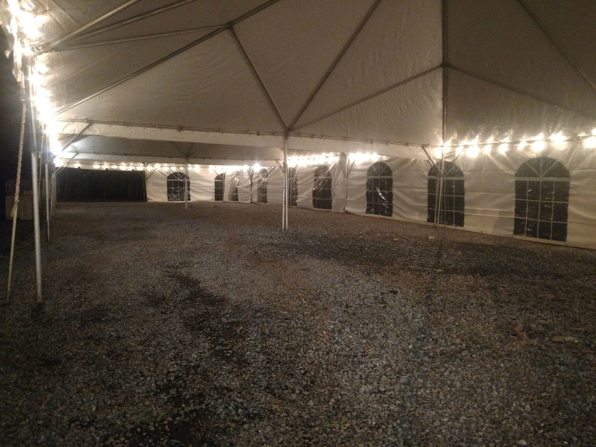 A white tent with lights