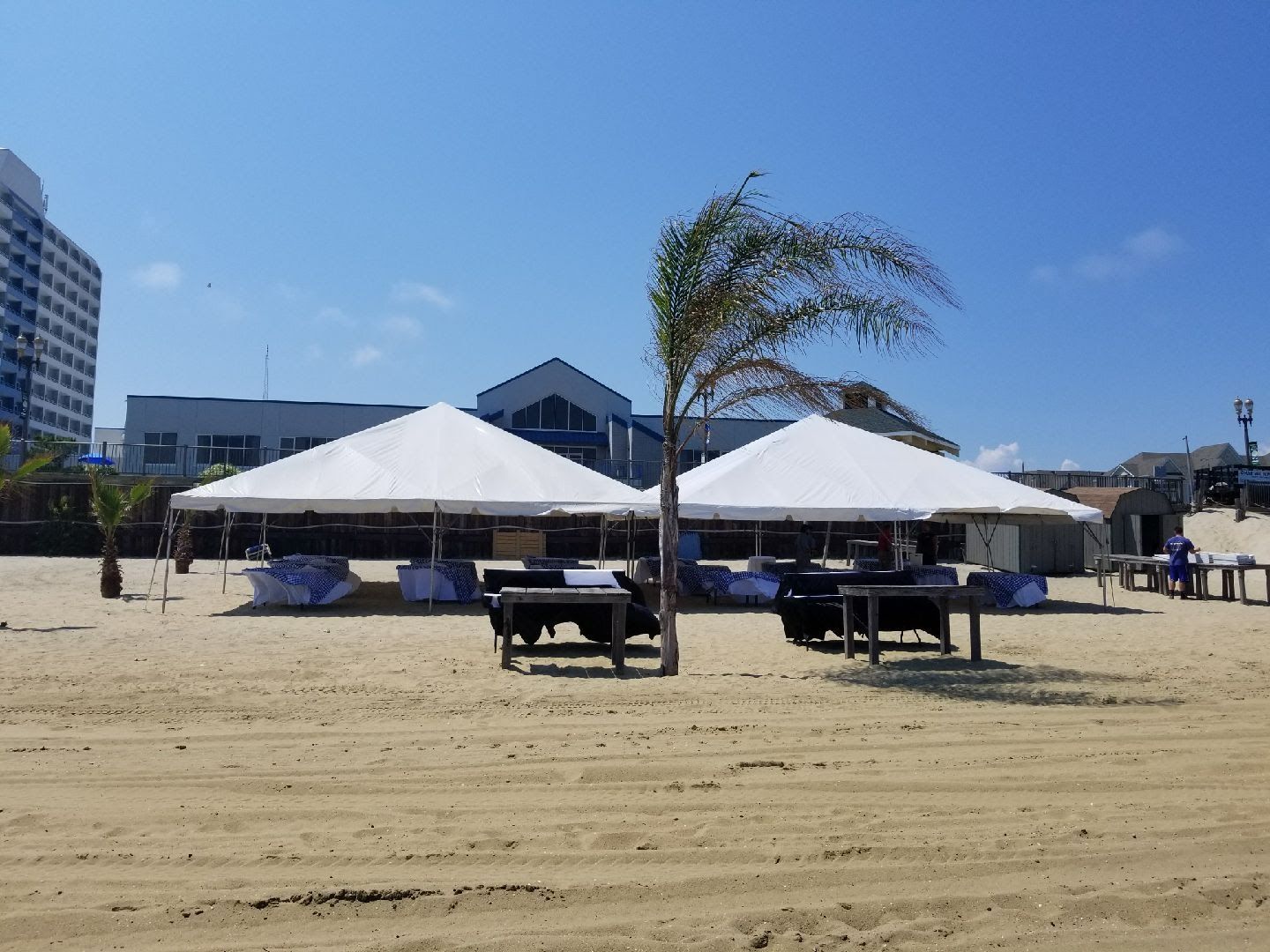 A white tent near the beach side